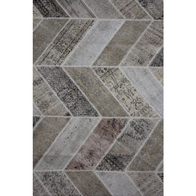 A beautiful Vintage Patchwork Rug . It's in very good condition, practically new. This Patchworks Rug is produced of older...