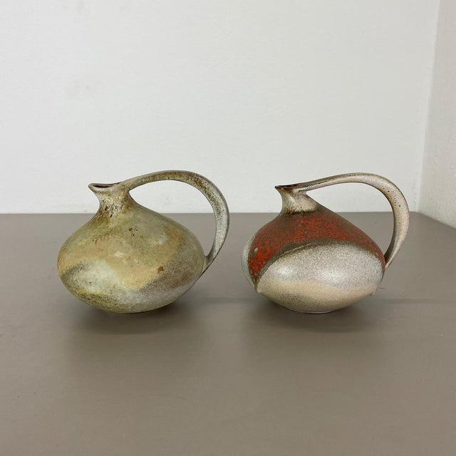 Article: set of 2 vases. Design: Kurt Tschörner. Producer: Ruscha, Germany. Decade: 1960s: This original vintage vase set...
