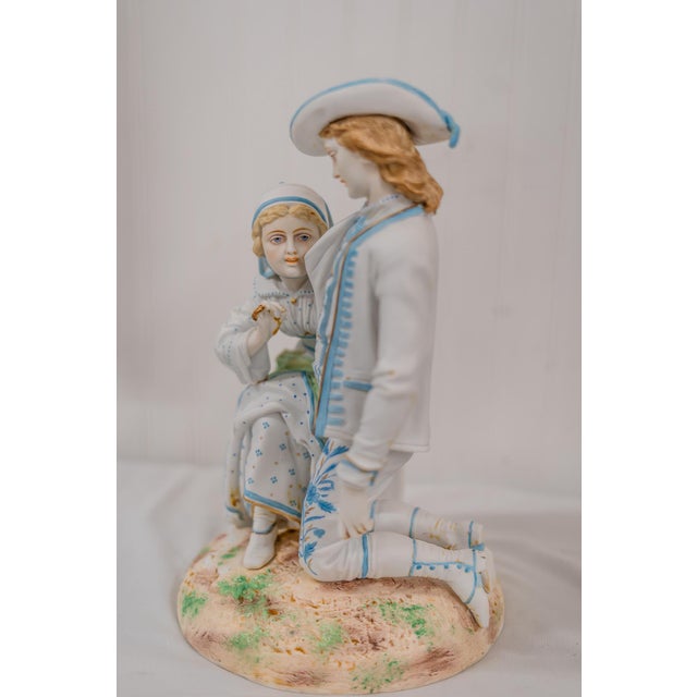 Home Inspirations Auctions is pleased to offer This beautiful bisque statue of a young couple in love. it is the perfect...