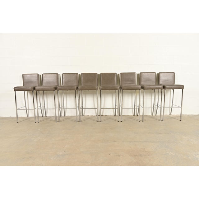 A gorgeous set of eight contemporary or Modern "Switch" bar stools By Coalesse for Steelcase USA, 2010 Leather upholstered...