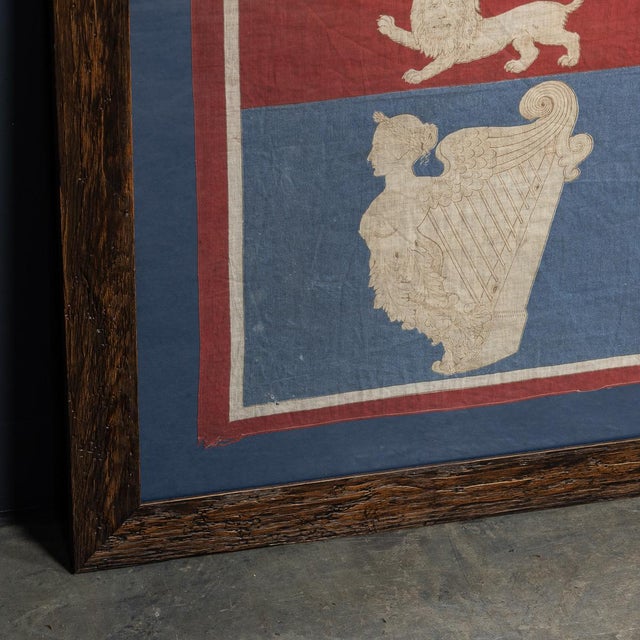 An excellent 20th Century Victorian Royal Standard presented in a reclaimed wood frame. This flag, reserved for the...