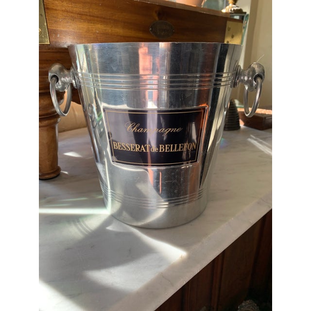 Here we have a vintage French champagne ice bucket. Black Besserat de Bellefon metal labels on each side, they have been...