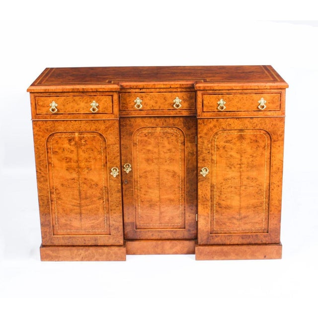A superb quality Victorian flame pollard oak inverted breakfront sideboard, circa 1870 in date. The sideboard features...