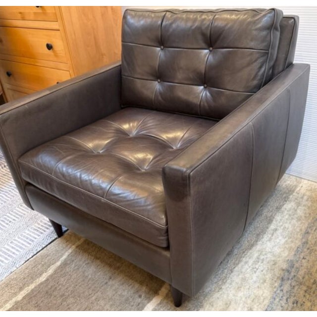 Design Plus Gallery presents the Petrie Leather Chair, from Crate & Barrel. A modern classic with the timelessness of mid-...