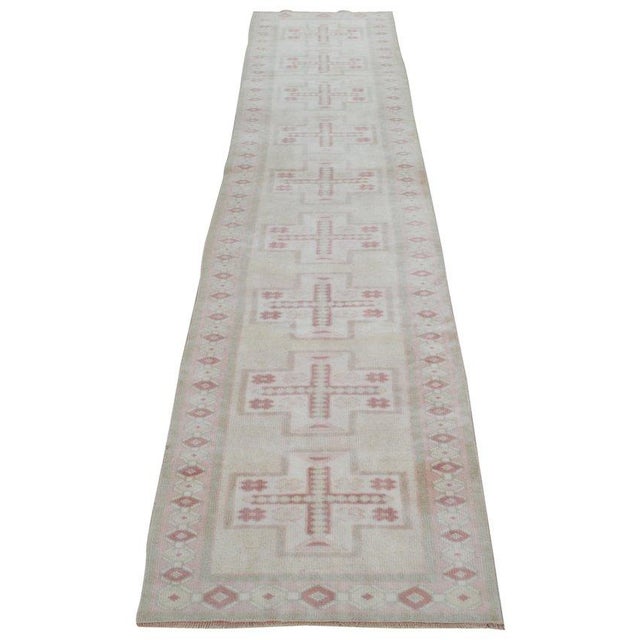 Hand-knotted with care using traditional rug-making techniques, this wool rug blends timeless craftsmanship with a modern...