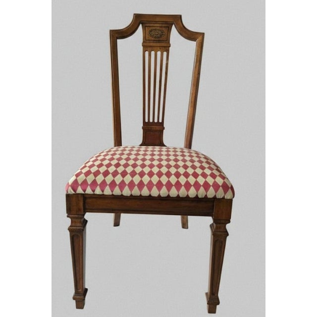 Set of 4 vintage Dining Chairs Carved back spindle, tapered legs Sturdy and heavy Measures @ 38'' X 20'', floor to arm...