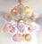 Italian sputnik chandelier with 24 multicolored Murano glass globes in satin matte finish, mounted on brass frame in...
