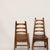 A set of 4 vintage arts and crafts style dining chairs by webber made in the 1950s. Tapered ladder backs, slatted seats....