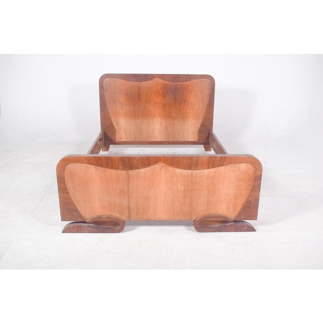 This double bed is a striking example of Portuguese Art Deco design from the early 20th century. Crafted in wood, it...