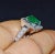 Certified natural 950 solid platinum 4.69CTS diamond and emerald ring. This ring is studded with 32 large round brilliant...