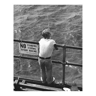 1975 Santa Monica Pier Fisherman Photograph by Don Ware For Sale