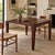 Sculptural square dining or game table by Alias, Italy, featuring a rich dark wood finish and beautifully curved edges...