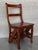 Decorate a library or study with this artisan-made folding step ladder chair. Crafted in Southern France circa 1950, the...