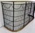 A beautifully handcrafted vintage fireplace fender featuring a graceful bowed front with hand-forged wrought iron...