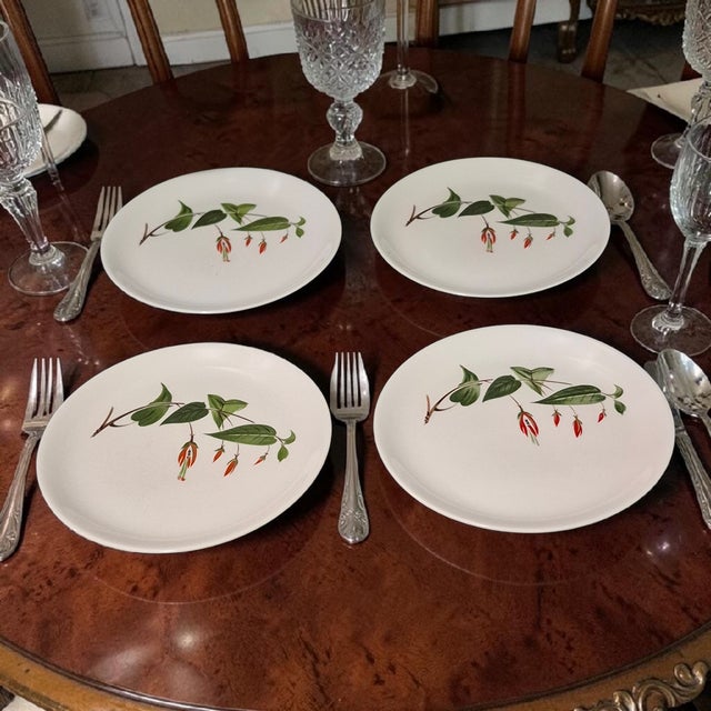 The Vintage Four Salem U.S.A Floral Primrose Fuchsia Dessert Salad Plates are a set of round stoneware plates made in...