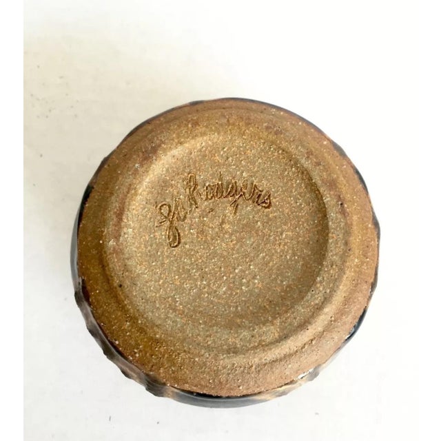 we have for your consideration a very beautiful mid century modern studio art pottery. this piece of pottery consists of a...