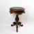Exquisite round side table crafted from rich burr walnut with ornate gilt brass embellishments in the Louis XV style....