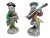 Vintage Monkey statues playing musical instruments. Beautiful array of colors and patterns. Monkeys wearing clothing and...