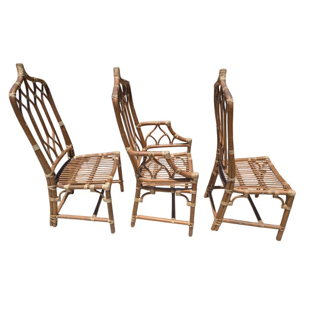 Wonderful set of vintage rattan chairs. We may have cushions, but they would be third party and not the originals. One...