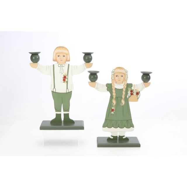 A pair of gnome children as candlesticks. These pieces are a tradition in Sweden for tables and window sills around...