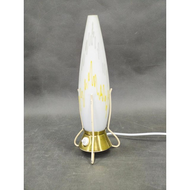 Rare mid century modern table lamp produced by zukov in czechoslovakia during the 1960s. This striking sculptural piece...