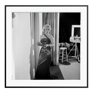 Marilyn Monroe on the Set of "How to Marry a Millionare" Black Framed Archival Pigment Print For Sale