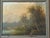 This original oil painting by A. Hobart features a tranquil European countryside scene rendered in soft, atmospheric...