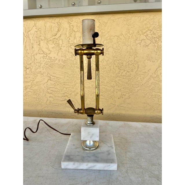 Vintage mid-century modern adjustable desk lamp. Marble marked made in Italian with two adjustable brass handles. Great...