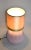 Large (25 cm diameter) table lamp with solid wooden ball (salmon colors) as the basis. The lamp dates from the 1980s....