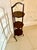 A charming mahogany three-tier folding cake stand elegant in form and beautifully made. The stand features three octagonal...