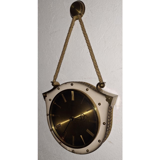 Mid-Century German Wall Clock by Atlanta, 1950s, in Very Good conditions. Designed 1950 to 1959 This piece has an...