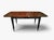 Elegant and luxurious French dining table from the 1970s, designed in the refined Art Deco style. Crafted from richly...