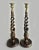 A pair of English tall oak open barley twist candlesticks with cast brass candle cups and bobeches, raised on a round...