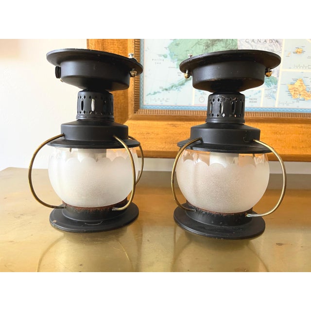Petite 1950s caged iron semi flush ceiling lights in sleek nautical style with frosted and scalloped glass globes, pierced...