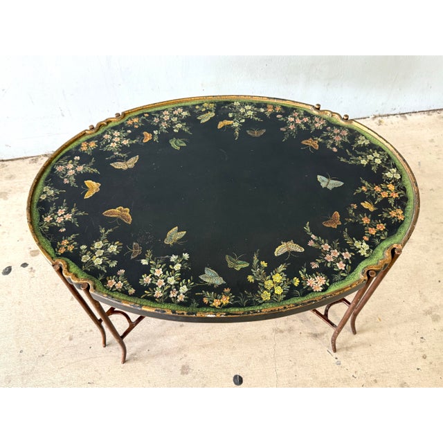 Lovely Vintage Regency style coffe / tray table with iron base. Top (tray) is hand is painted with an array of butterflies...