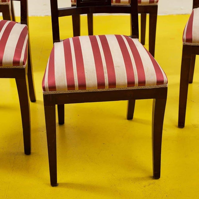 These exceptional chairs embody the elegance and sophistication of classic design. Crafted from fine wood, they feature a...