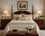 Crafted by Drexel Furniture, this elegant pair of vintage Georgian-style nightstands showcases timeless American...