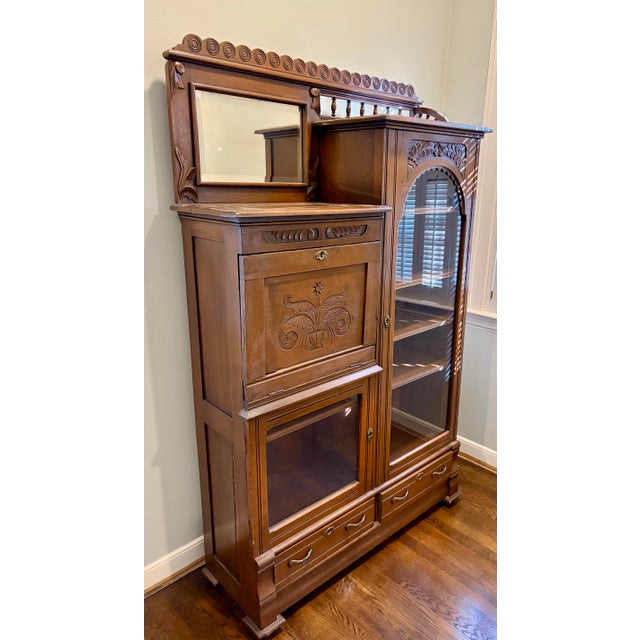 Wonderful, beautifully preserved antique, Victorian-style "side by side" secretary desk and china cabinet. It has a drop...