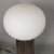 This ceramic table lamp has a white frosted, oval glass shade that is removable. Up to 250V (Europe/UK Standard).The...