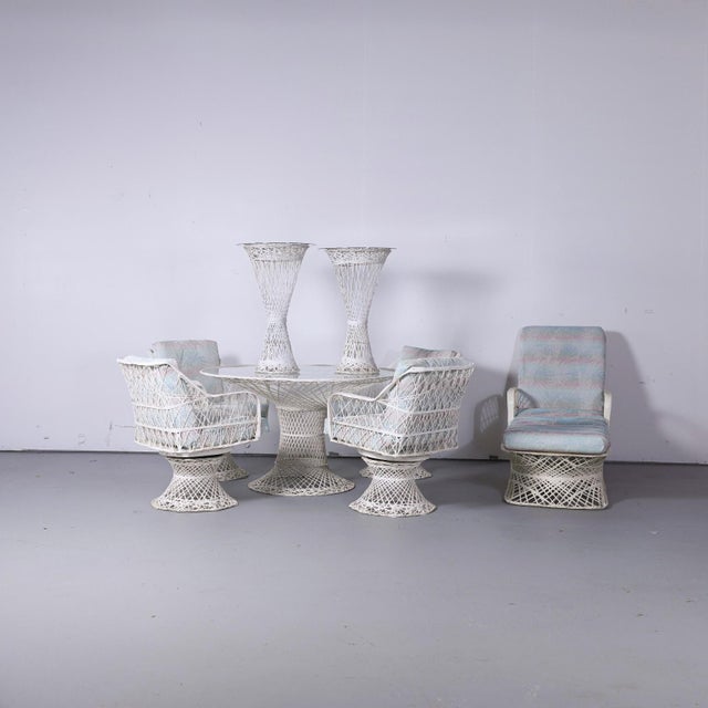 A fabulous vintage spun fiberglass patio set with incredible sculptural detailing and a wonderfully nostalgic coastal...