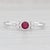 Gemstone Information: - Natural Ruby - Carats - 0.25ct Cut - Round Brilliant Color - Red Treatment - Routinely Enhanced -...