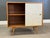 A mid century modern solid maple credenza chest cabinet designed by Paul McCobb for Winchendon’s Planner Group. Two off...