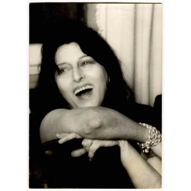 Portrait of Anna Magnani is a vintage b/w photographic print on single-coated paper, realized in 1960s. Rare and intense...