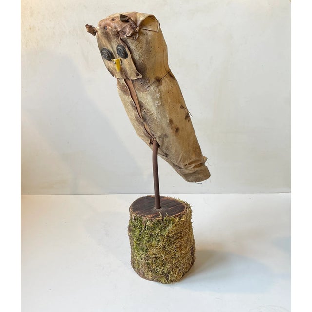 There is a great deal of rawness and authenticity to this 1930s French owl decoy. It is carved in wood and nail -...