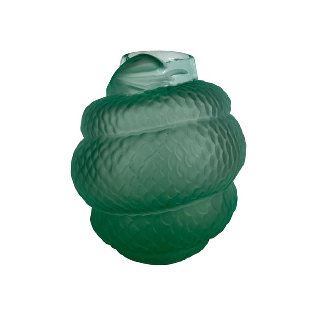 A striking vintage Lalique style art glass vase in a rich emerald green, featuring a sculptural snake wrapped around the...