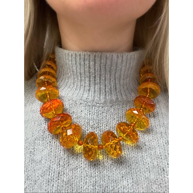 This fun and colorful Tiffany design by Paloma Picasso features faceted amber beads measuring approximately 20.00 - 32.00...