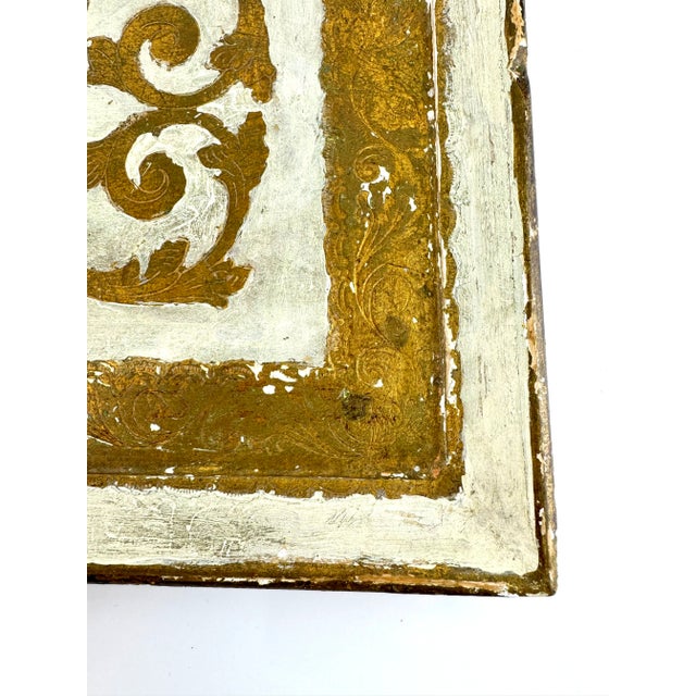 A vintage Florentia tray from Italy, crafted with gilt and painted details in the classic Florentine style. The...