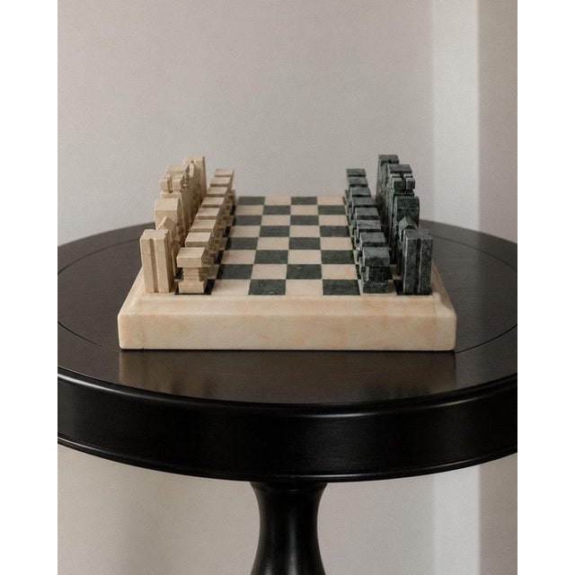 This vintage marble chess set from the 1970s combines timeless game design with sculptural elegance. The heavy stone board...