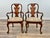 Traditional carved detailing meets an expressive animal-print accent in this matching set of eight Queen Anne–style dining...