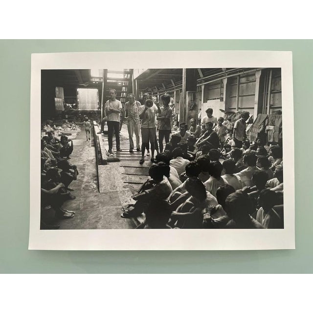 José Nicolas (1956) China Sea, Rose Schaffino 1987 Bernard Kouchner speaking to the boat people in the hold of the Ferry...